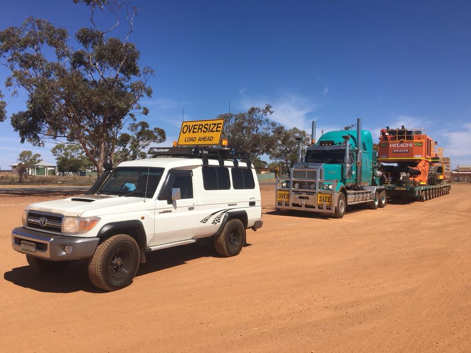Mining dump truck transport escort